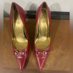 Deep red GUESS stiletto heels size ten buckle on the toe. Triangular toe box